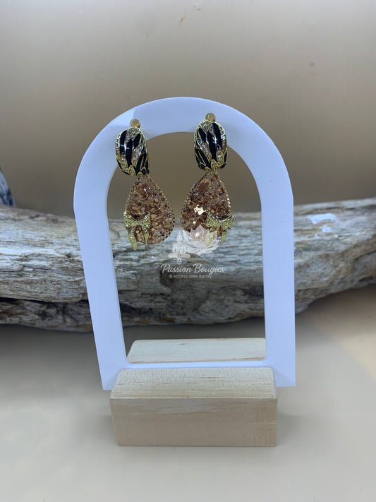 Boucles d’oreilles pailleté doré noeud