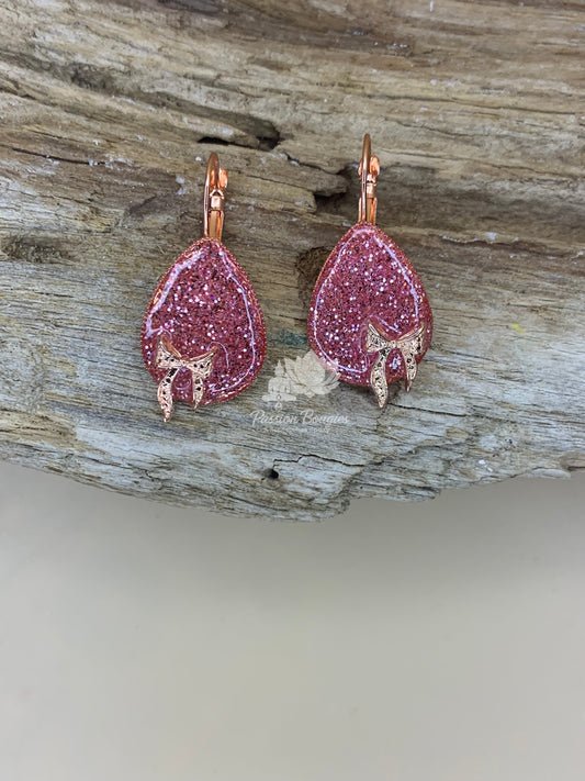 Boucles d’oreilles pailleté rosé noeud doré